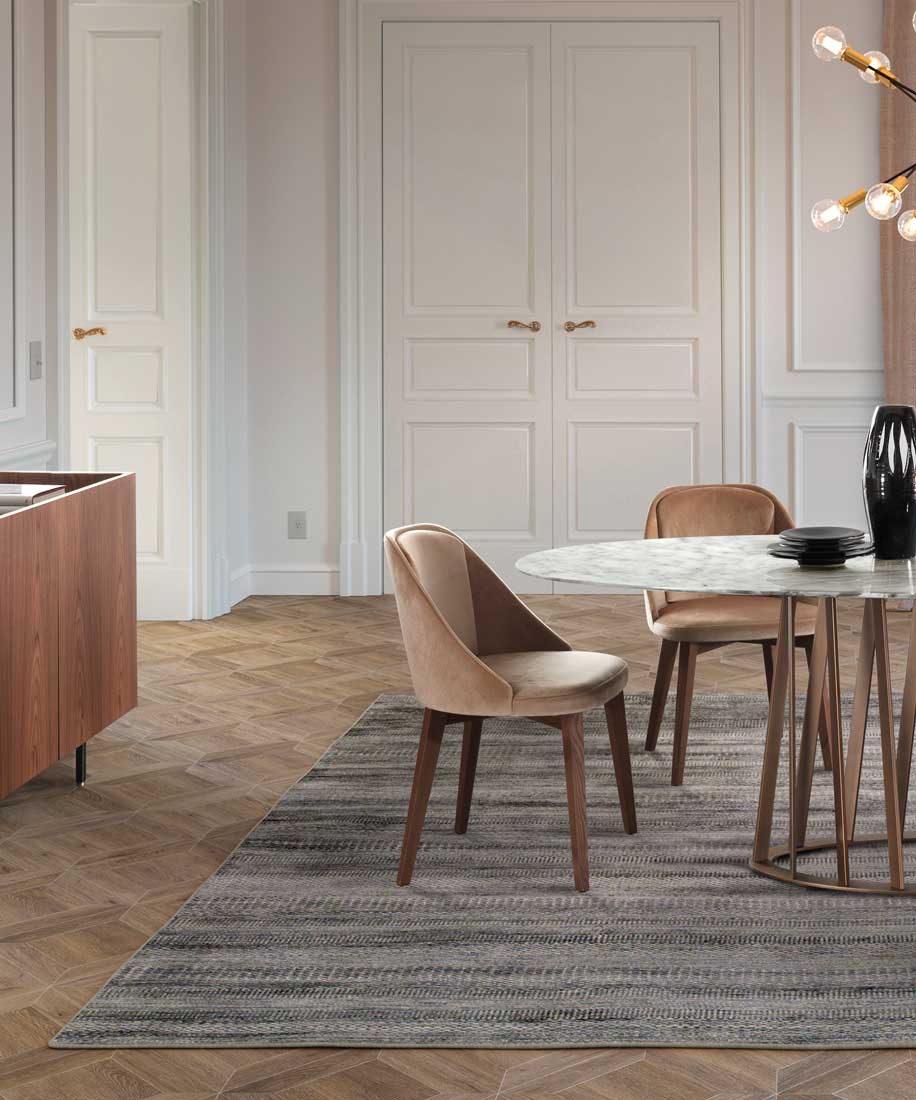 Amy: sedia imbottita in legno in ambiente moderno | Amy: upholstered wooden chair in a modern setting