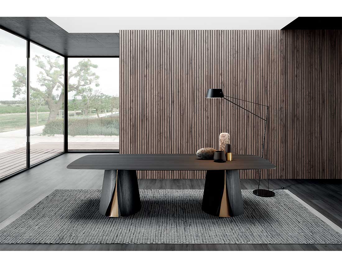 Shell: tavolo due basi in legno con piano legno a botte in ambiente moderno | Shell: table with two wooden bases with wooden barrel top in a modern setting